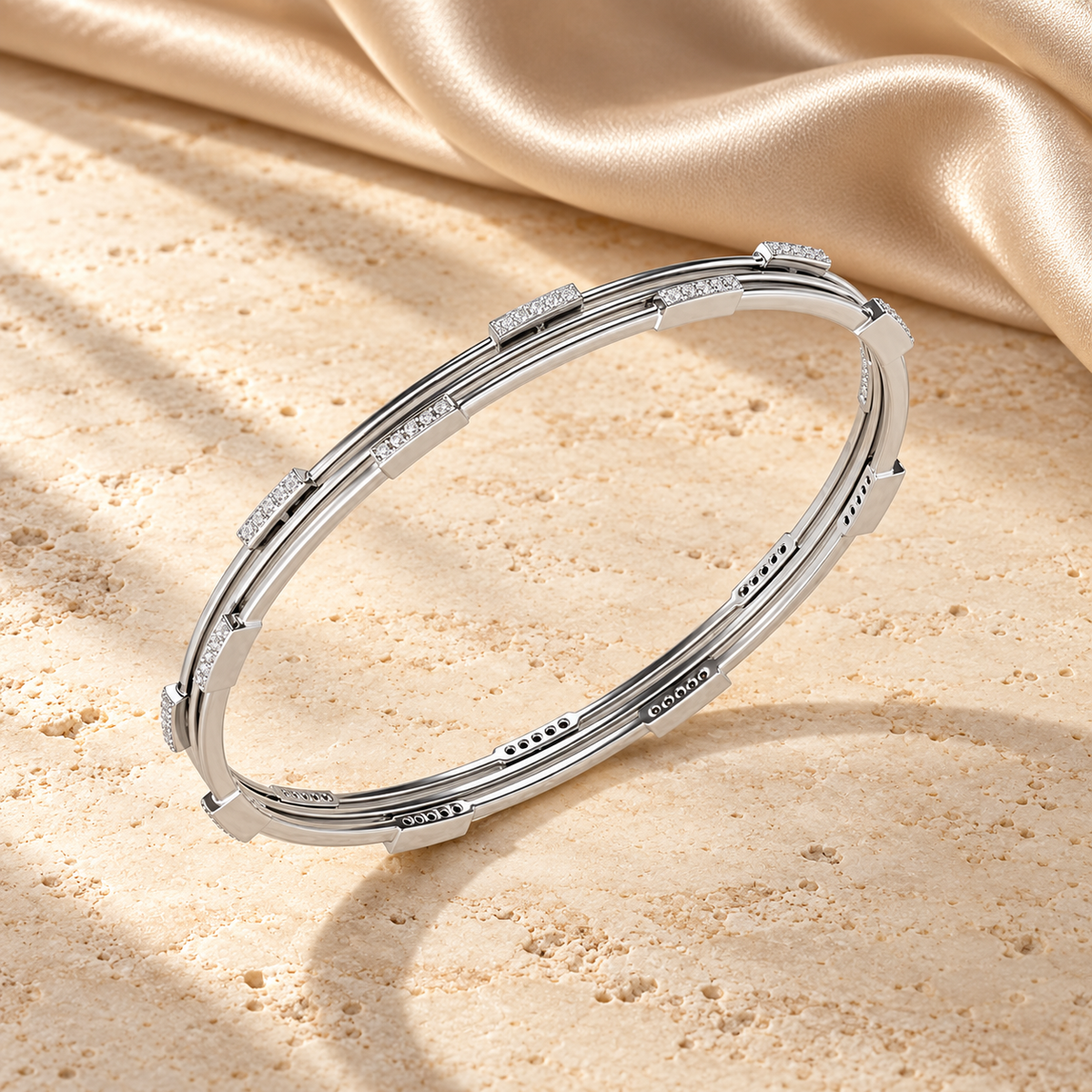 Stripe Wave Silver Bangles in white gold on travertine and champagne silk