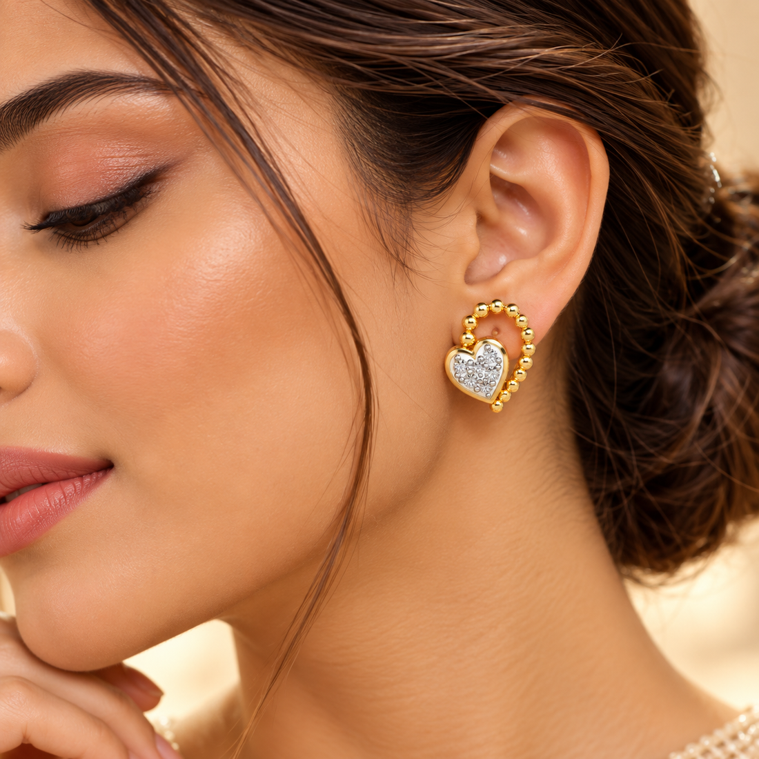 Clutched Heart Silver Earrings
