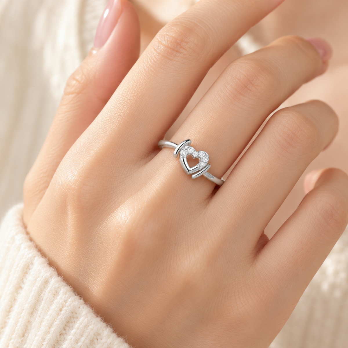 Airy Heart Silver Ring in white gold worn on hand