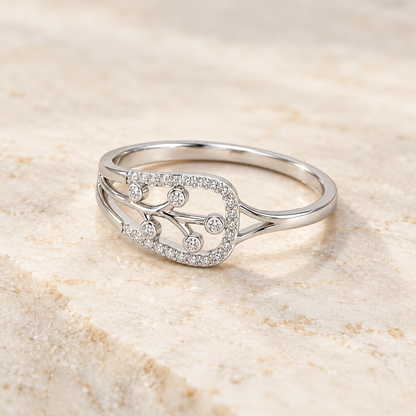 Bliss Vine Silver Ring resting on ivory stone