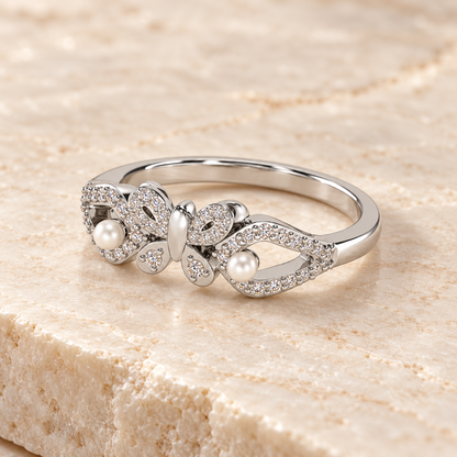 Blissfly Silver Pearl Ring resting on ivory stone