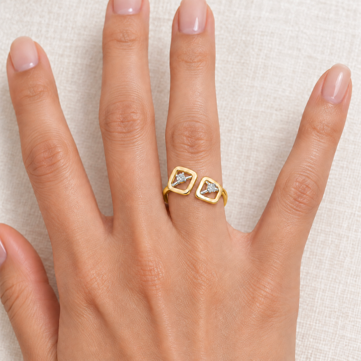 Inverted Twigs Silver Ring, gold finish, model worn on one finger, square