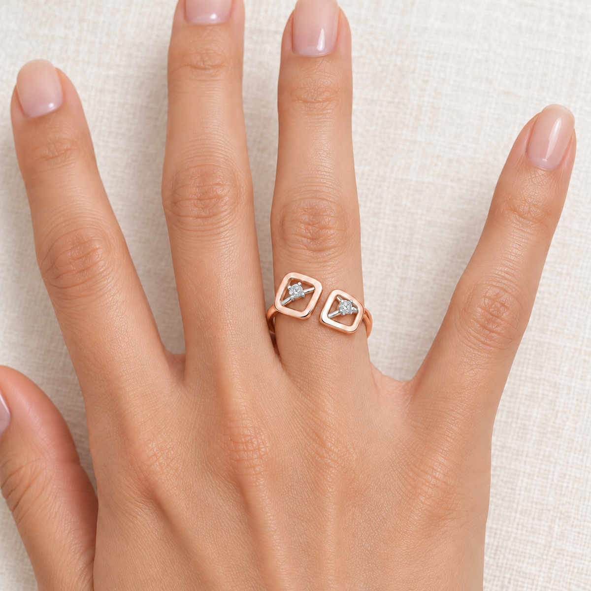 Inverted Twigs Silver Ring, rose finish, model worn on one finger, square