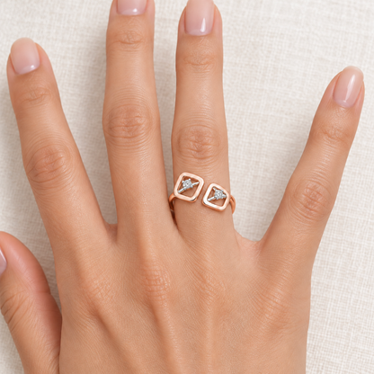 Inverted Twigs Silver Ring, rose finish, model worn on one finger, square