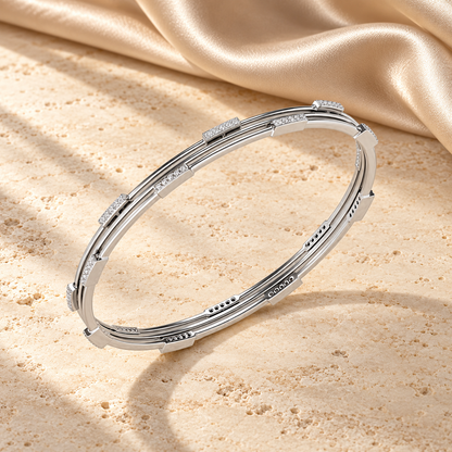 Stripe Wave Silver Bangles in white gold on travertine and champagne silk