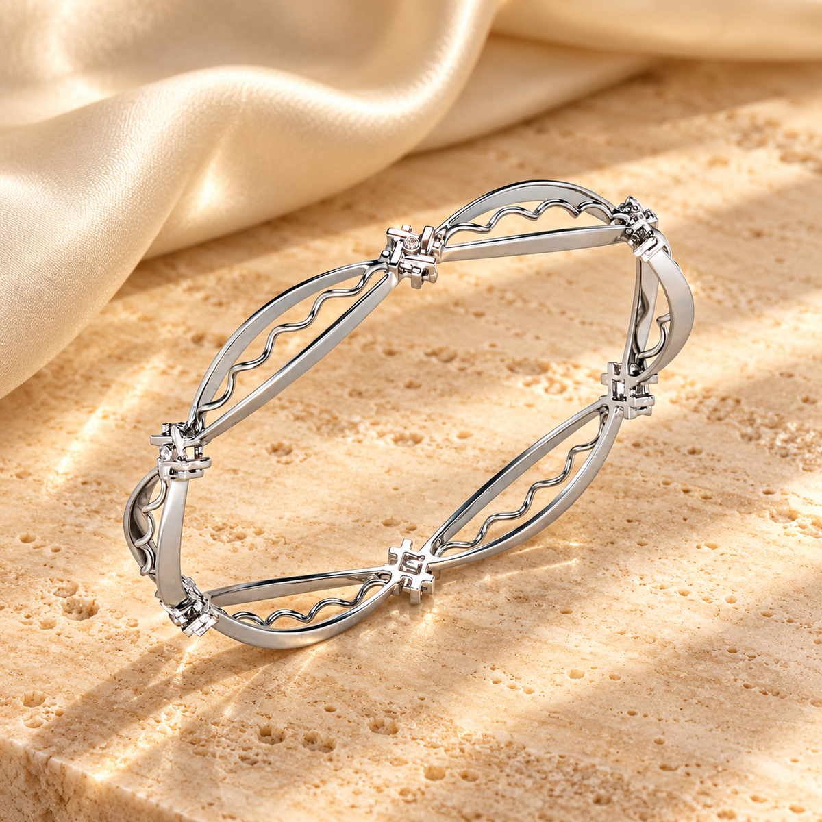 Vibe Catch Silver Bangles in white gold on travertine and champagne silk