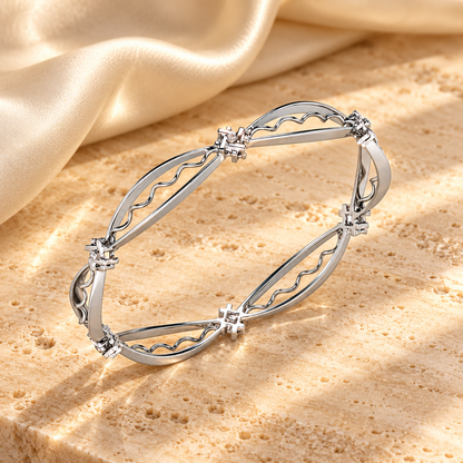 Vibe Catch Silver Bangles in white gold on travertine and champagne silk